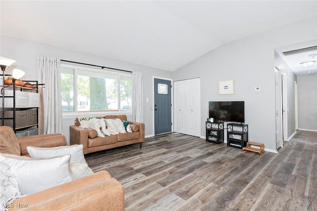 3498 Clayton Dr, North Olmsted, OH 44070 - living room featuring lofted ceiling and wood finished floors