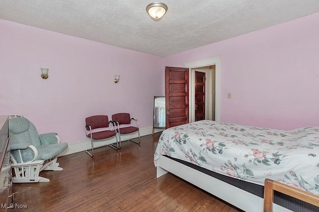 1744 Northfield Ave, East Cleveland, OH 44112 - bedroom featuring hardwood / wood-style flooring and a textured ceiling