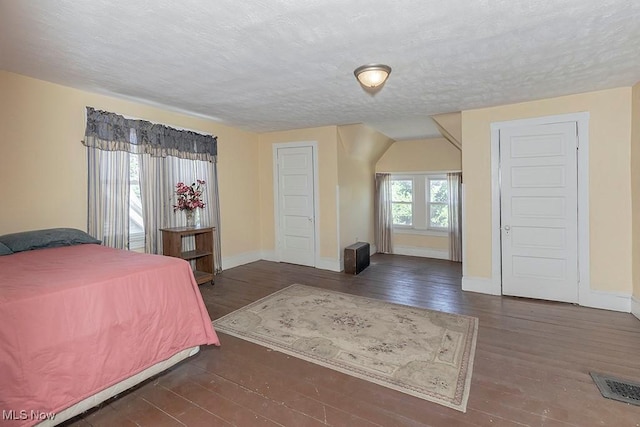 1744 Northfield Ave, East Cleveland, OH 44112 - bedroom featuring hardwood / wood-style floors and a textured ceiling
