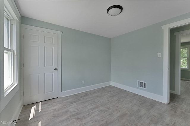 533 12th St, Campbell, OH 44405 - unfurnished bedroom featuring wood finished floors and baseboards