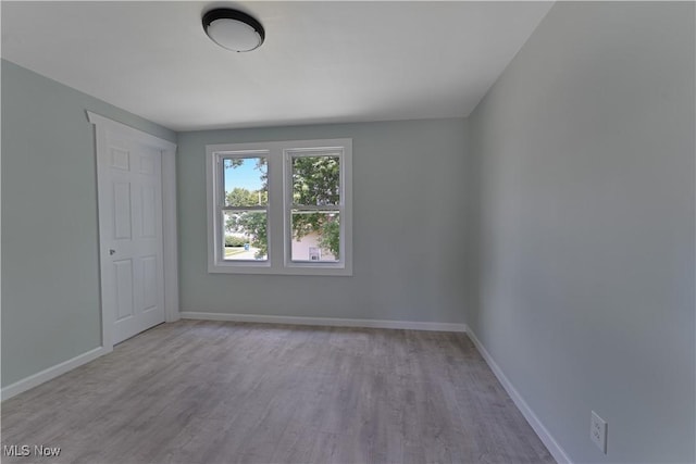 533 12th St, Campbell, OH 44405 - unfurnished bedroom featuring wood finished floors and baseboards