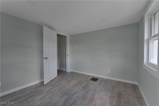 533 12th St, Campbell, OH 44405 - unfurnished room featuring wood finished floors and baseboards