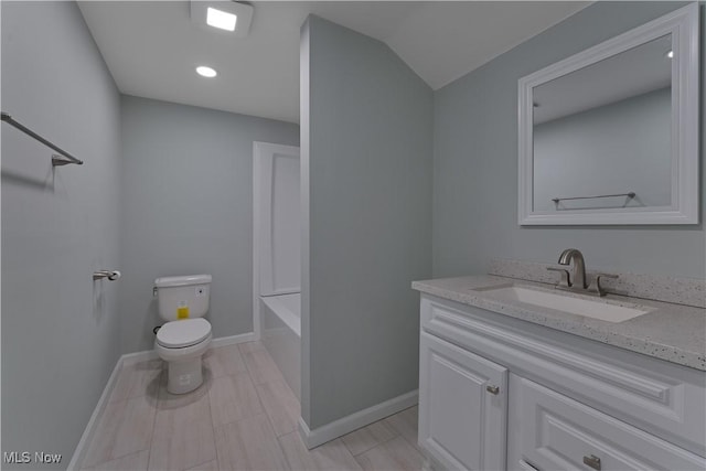 533 12th St, Campbell, OH 44405 - bathroom with vanity, a bath, and recessed lighting