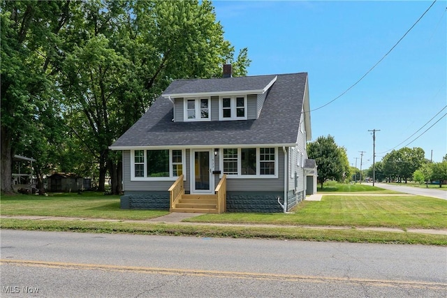 533 12th St, Campbell, OH 44405 - bungalow-style house with a front lawn, a chimney, and a shingled roof