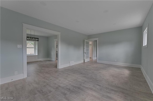 533 12th St, Campbell, OH 44405 - unfurnished room with wood finished floors