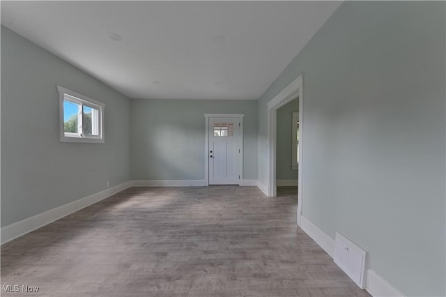 533 12th St, Campbell, OH 44405 - empty room with baseboards and wood finished floors
