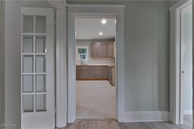 533 12th St, Campbell, OH 44405 - corridor with light wood-style floors and recessed lighting
