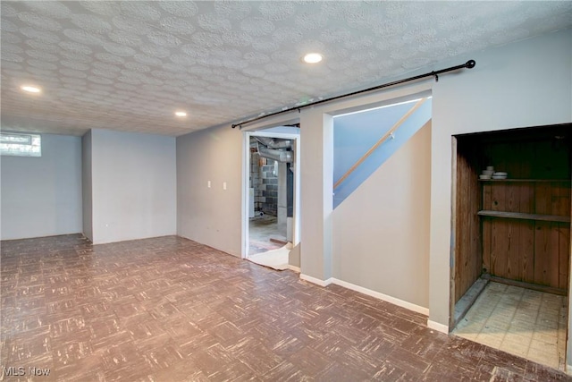 4606 Maplecrest Ave, Parma, OH 44134 - below grade area featuring a textured ceiling and recessed lighting