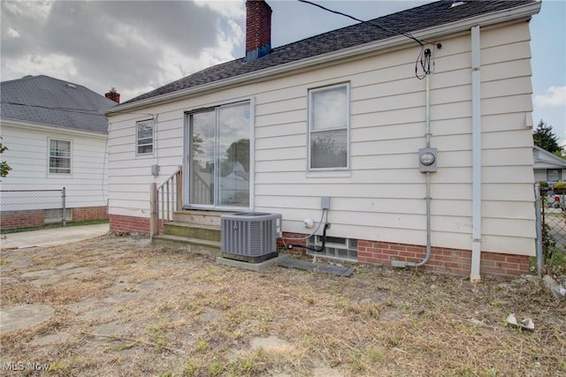 4606 Maplecrest Ave, Parma, OH 44134 - back of house featuring entry steps and a chimney