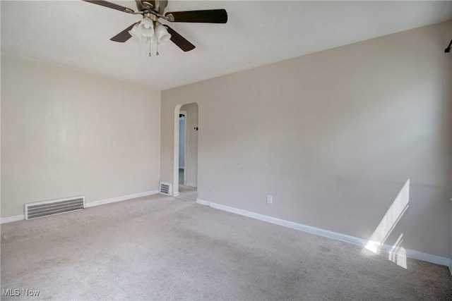 4606 Maplecrest Ave, Parma, OH 44134 - empty room with arched walkways, light colored carpet, and ceiling fan