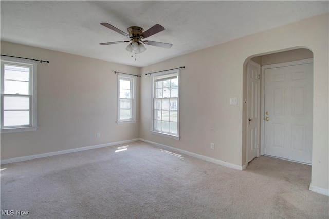 4606 Maplecrest Ave, Parma, OH 44134 - carpeted spare room featuring arched walkways and a ceiling fan