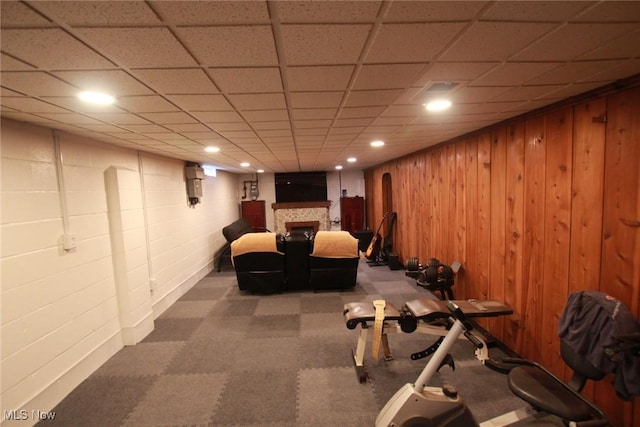 72 S Hartford Ave, Youngstown, OH 44509 - interior space with carpet flooring, a fireplace, recessed lighting, wood walls, and arched walkways