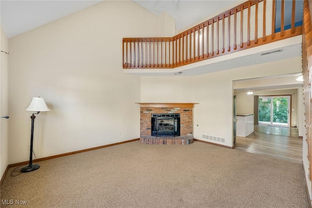11253 Hampton Bay Ln, Concord, OH 44077 - unfurnished living room with carpet floors, high vaulted ceiling, and a fireplace