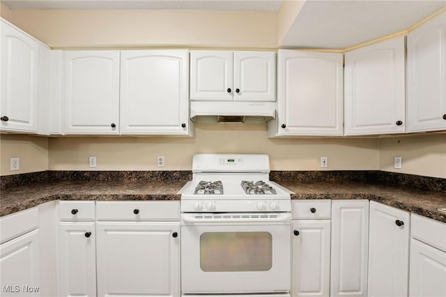 11253 Hampton Bay Ln, Concord, OH 44077 - kitchen featuring white gas range oven, under cabinet range hood, and dark countertops