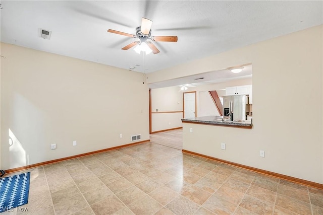 11253 Hampton Bay Ln, Concord, OH 44077 - empty room featuring ceiling fan and baseboards