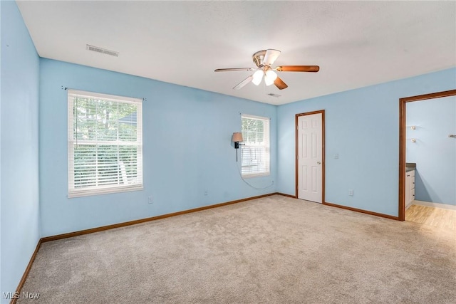 11253 Hampton Bay Ln, Concord, OH 44077 - carpeted empty room with healthy amount of natural light and ceiling fan