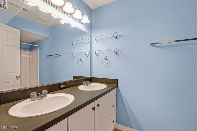 11253 Hampton Bay Ln, Concord, OH 44077 - full bathroom featuring double vanity and a shower