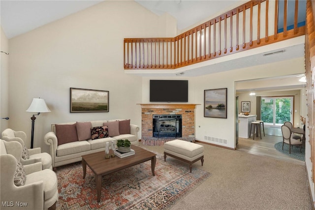 11253 Hampton Bay Ln, Concord, OH 44077 - living area with high vaulted ceiling, carpet floors, and a fireplace