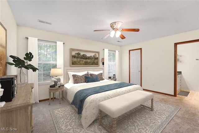 11253 Hampton Bay Ln, Concord, OH 44077 - bedroom featuring light colored carpet, multiple windows, a ceiling fan, and connected bathroom