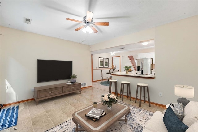 11253 Hampton Bay Ln, Concord, OH 44077 - living room featuring baseboards and ceiling fan