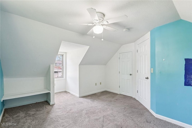 1811 Stepney St, Niles, OH 44446 - additional living space with carpet floors, vaulted ceiling, and a ceiling fan