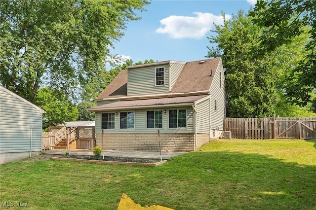 1811 Stepney St, Niles, OH 44446 - back of house with a fenced backyard and roof with shingles