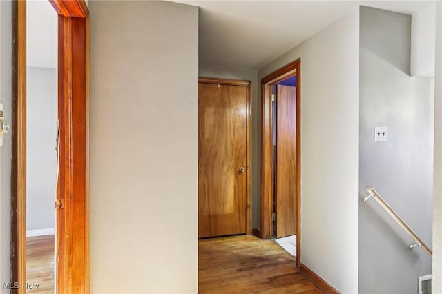2992 Eldora Dr, Youngstown, OH 44511 - corridor with an upstairs landing and wood finished floors