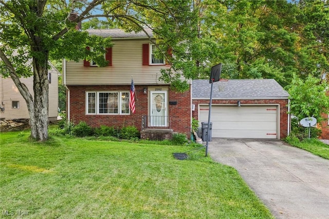 2992 Eldora Dr, Youngstown, OH 44511 - colonial home with a front yard, an attached garage, driveway, and brick siding