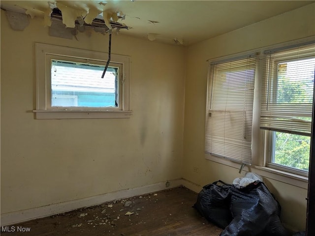14717 Orinoco Ave, East Cleveland, OH 44112 - spare room with baseboards and wood finished floors