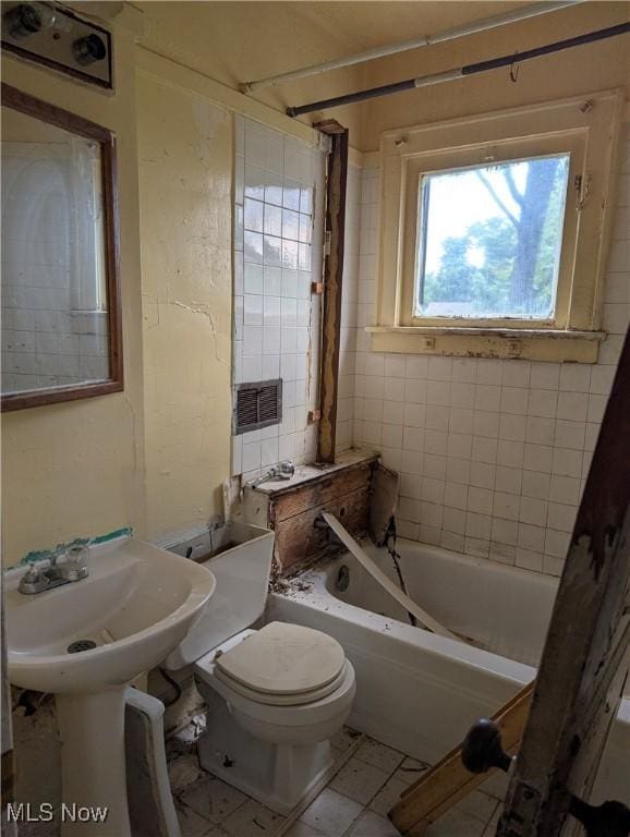 14717 Orinoco Ave, East Cleveland, OH 44112 - full bathroom featuring shower / bathtub combination and tile patterned flooring