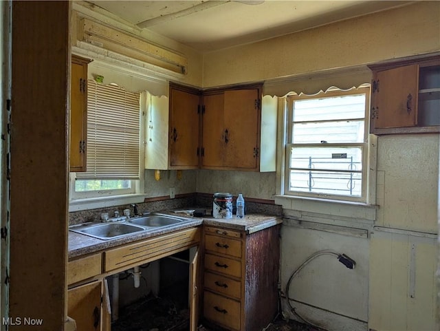 14717 Orinoco Ave, East Cleveland, OH 44112 - kitchen with brown cabinetry and open shelves