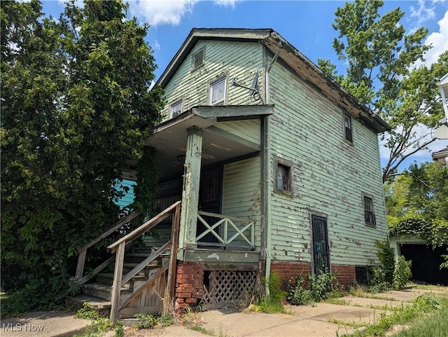 14717 Orinoco Ave, East Cleveland, OH 44112 - view of home's exterior featuring a porch