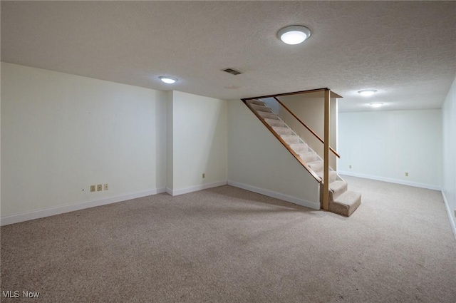 24 Heather Cir, Washington, WV 26181 - finished basement with carpet flooring, stairs, and a textured ceiling