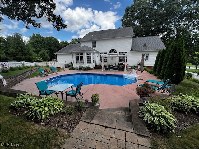 660 Rustic Knoll Dr, Kent, OH 44240 - view of swimming pool featuring a patio and a wooden deck