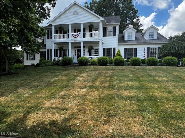 660 Rustic Knoll Dr, Kent, OH 44240 - view of front of property with a balcony, a porch, and a front lawn
