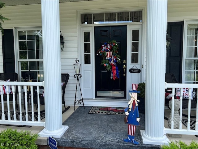 660 Rustic Knoll Dr, Kent, OH 44240 - doorway to property featuring covered porch