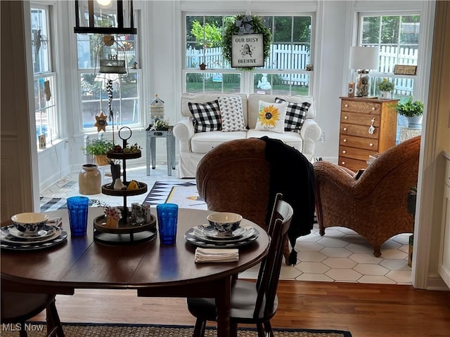 660 Rustic Knoll Dr, Kent, OH 44240 - dining area featuring plenty of natural light and wood finished floors