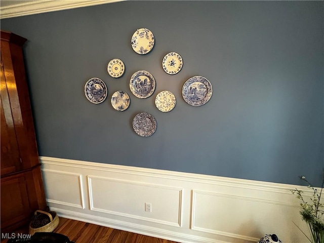 660 Rustic Knoll Dr, Kent, OH 44240 - detailed view of wainscoting, a decorative wall, and wood finished floors