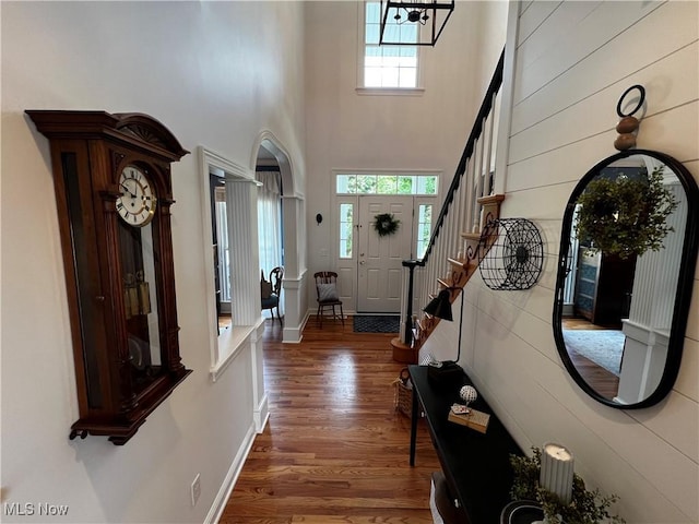 660 Rustic Knoll Dr, Kent, OH 44240 - foyer entrance with wood finished floors, a towering ceiling, and stairs