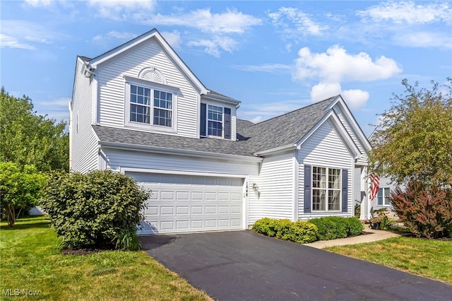 1648 E Turkey Run Dr, Newark, OH 43055 - traditional-style house with driveway, a garage, a shingled roof, and a front yard