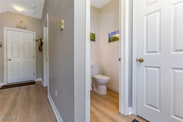 1648 E Turkey Run Dr, Newark, OH 43055 - bathroom featuring wood finished floors and vaulted ceiling