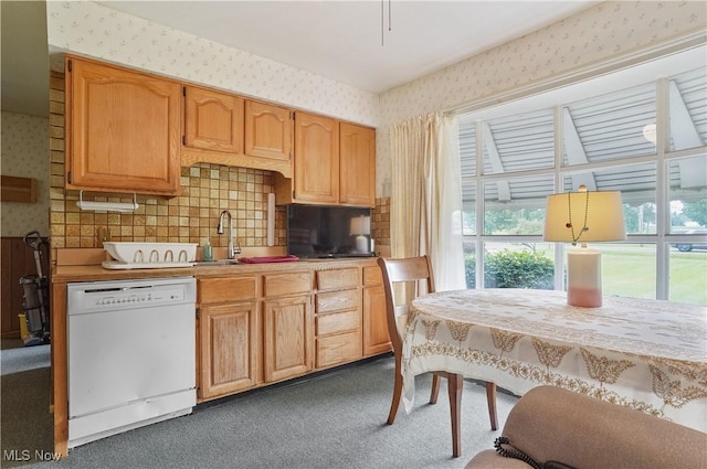 136 N Chillicothe Rd, Aurora, OH 44202 - kitchen featuring dishwasher, wallpapered walls, carpet flooring, light countertops, and backsplash