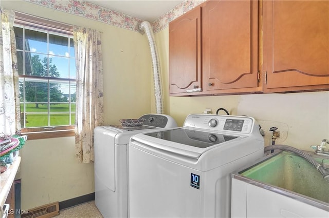 136 N Chillicothe Rd, Aurora, OH 44202 - washroom featuring cabinet space and washing machine and clothes dryer