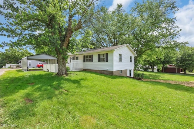 201 Hancock St, Woodsfield, OH 43793 - view of front of home featuring a carport and a front yard