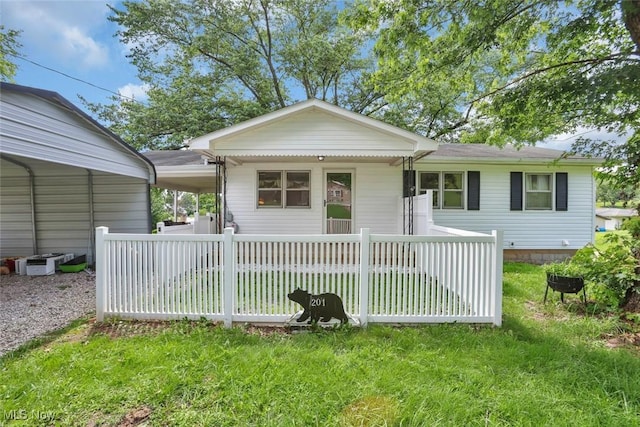 201 Hancock St, Woodsfield, OH 43793 - view of front of home featuring a carport, a front yard, and driveway