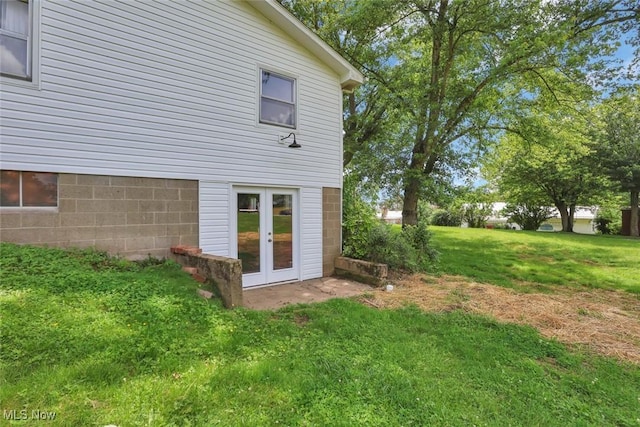 201 Hancock St, Woodsfield, OH 43793 - back of house featuring french doors and a lawn