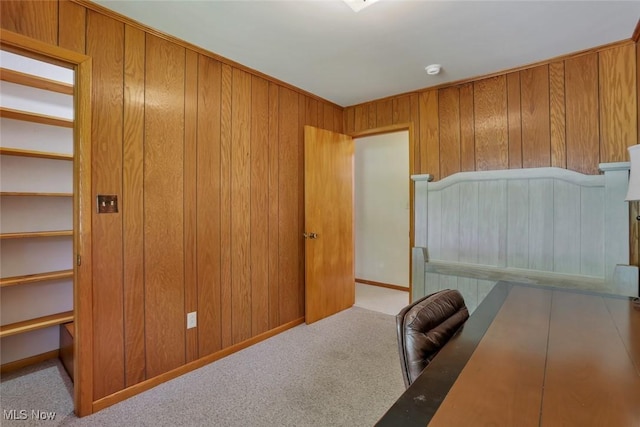 201 Hancock St, Woodsfield, OH 43793 - office area with wooden walls and carpet floors