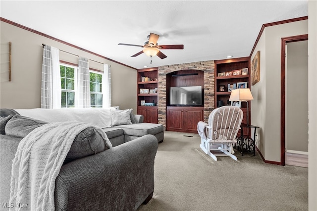 1467 Notman Rd, Deerfield, OH 44411 - living room featuring crown molding, a ceiling fan, carpet, and built in features