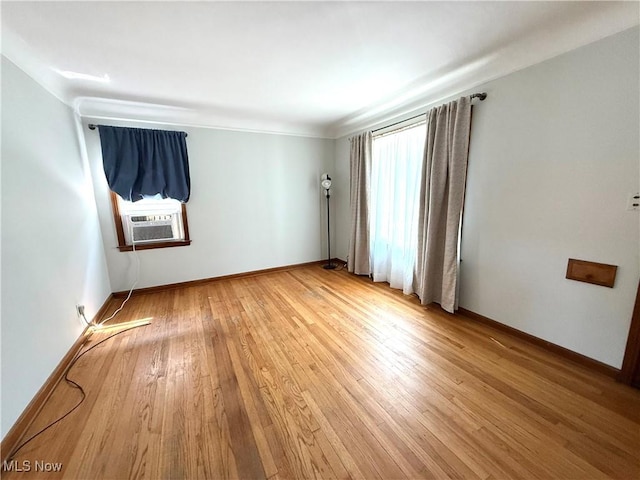 21571 Ball Ave, Euclid, OH 44123 - unfurnished room featuring cooling unit and light wood finished floors