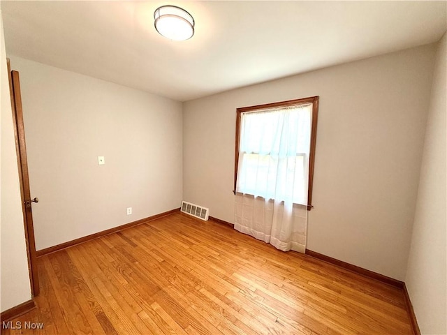 21571 Ball Ave, Euclid, OH 44123 - empty room with light wood finished floors and baseboards